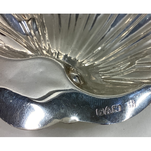 176 - CHESTER: A good plain silver butter shell of fluted design. Approx. 78 grams. Est. £40 - £60.