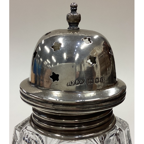 179 - A good cut-glass and silver mounted sugar caster with pierced decoration. Birmingham. Est. £20 - £30... 