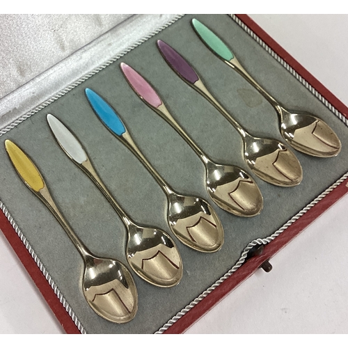 220 - A set of six Danish silver gilt and enamelled spoons. Approx. 60 grams. Est. £100 - £150.