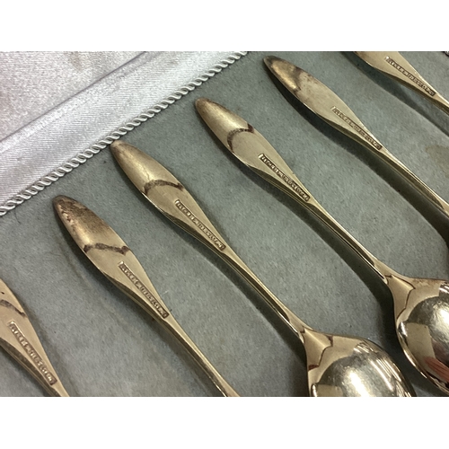 220 - A set of six Danish silver gilt and enamelled spoons. Approx. 60 grams. Est. £100 - £150.