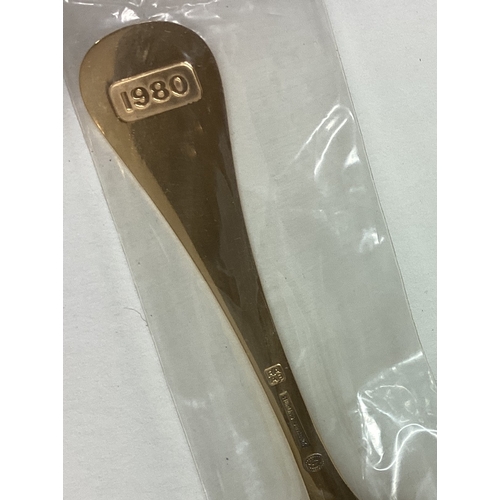 238 - GEORG JENSEN: A silver gilt and enamelled spoon with floral decoration. Approx. 45 grams. Est. £40 -... 