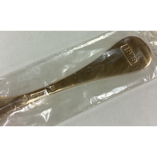 239 - GEORG JENSEN: A silver gilt and enamelled spoon with floral decoration. Approx. 45 grams. Est. £40 -... 