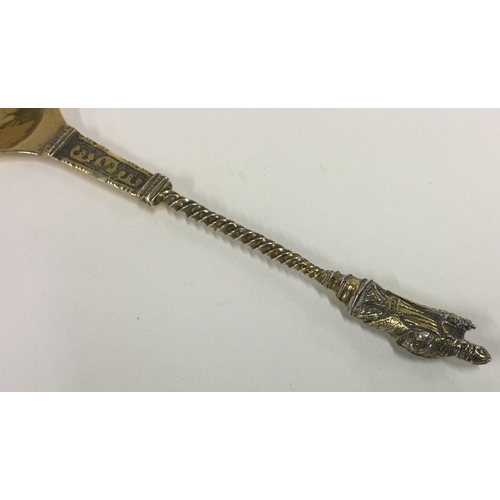 248 - A large Antique Continental silver gilt spoon. Approx. 60 grams. Est. £50 - £80.