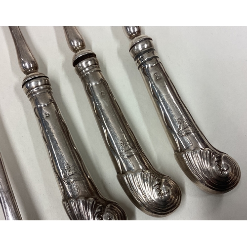 257 - A group of silver plated OE pattern soup spoons together with some silver pistol handled forks. Est.... 