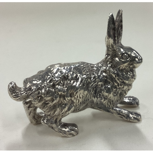 28 - A heavy silver figure of a rabbit. Marked 930 to foot. Approx. 57 grams. Est. £80 - £120.