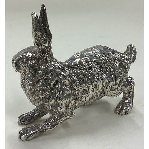 28 - A heavy silver figure of a rabbit. Marked 930 to foot. Approx. 57 grams. Est. £80 - £120.