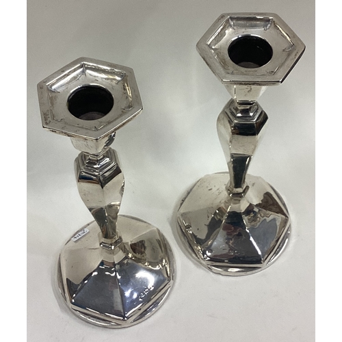 294 - A tall pair of shaped silver candlesticks. Birmingham. Approx. 388 grams of gross weight. Est. £30 -... 