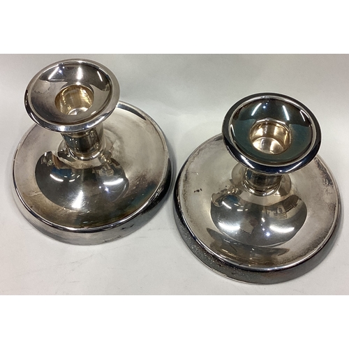 295 - DAVID ANDERSEN: A good pair of heavy plain Norwegian silver candlesticks. Approx. 509 grams of gross... 