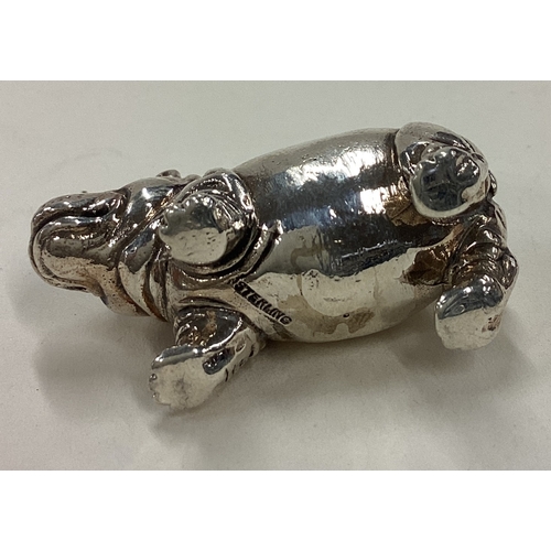 30 - A Sterling silver figure of a hippo. Approx. 20 grams. Est. £30 - £40.