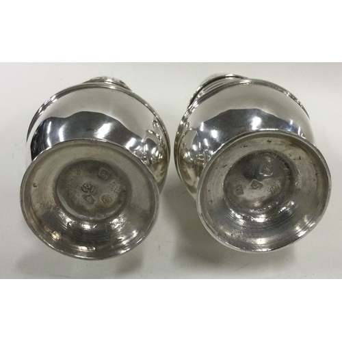 332 - A fine pair of George II silver sugar casters. London 1731. By Samuel Wood. Approx. 371 grams. Est. ... 