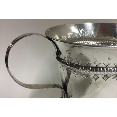 337 - A 17th Century Queen Anne silver porringer. London 1692. By William Gamble. Approx. 231 grams. Est. ... 