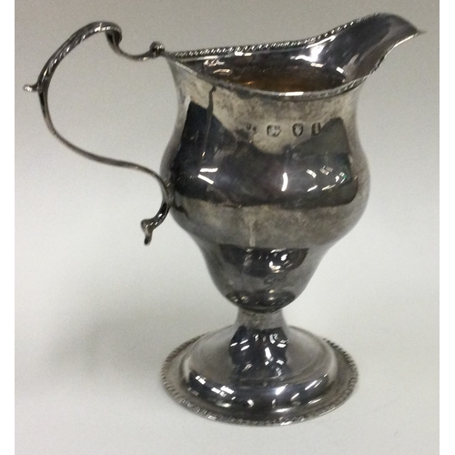 352 - A George III silver cream jug. London 1784. Approx. 92 grams. Est. £80 - £120.