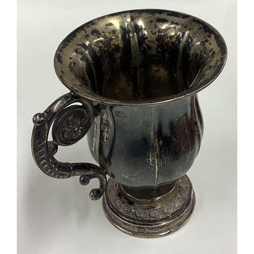 365 - A Continental silver christening mug. Marked to side. Approx. 119 grams. Est. £100 - £150.