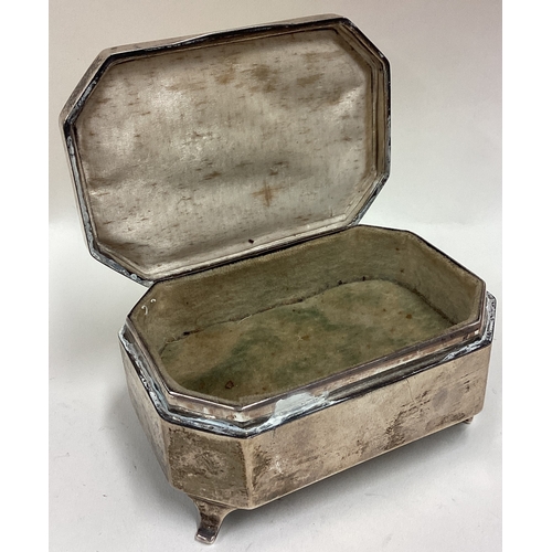 376 - A large silver and yellow enamelled jewellery box on feet. Birmingham 1933. Approx. 266 grams of gro... 