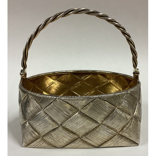 379 - A 19th Century Russian silver trompe-l'œil swing handled basket. Marked to base. Approx. 255 grams. ... 