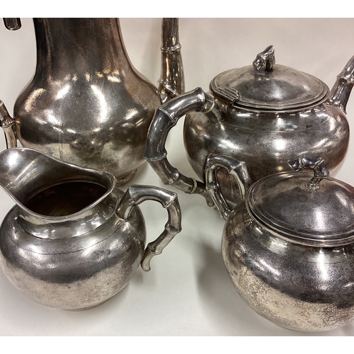 380 - A 19th Century Chinese export silver 4-piece tea set with hammered decoration. Circa 1880. By Zeewo.... 