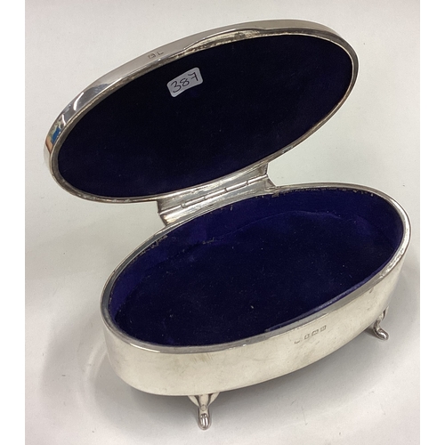 387 - A good oval silver and enamelled jewellery box with wreath decoration. Birmingham. Approx. 238 grams... 