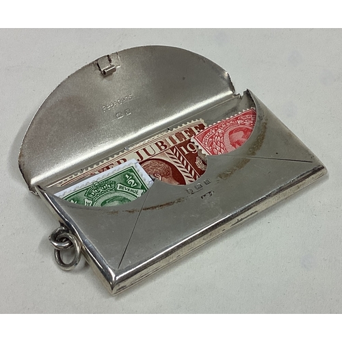 391 - A large hinged top silver stamp envelope. Birmingham. Approx. 18 grams. Est. £40 - £60.