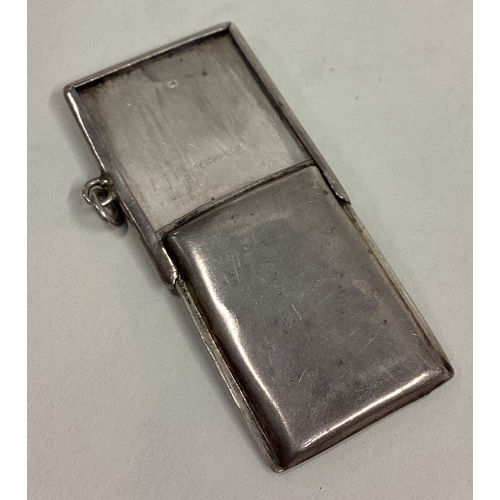 392 - An unusual silver stamp case of sliding form. Birmingham. Approx. 12 grams. Est. £20 - £30.