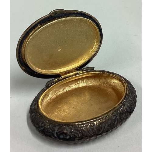 398 - A silver and enamelled pill box with hinged lid. Approx. 32 grams. Est. £30 - £40.