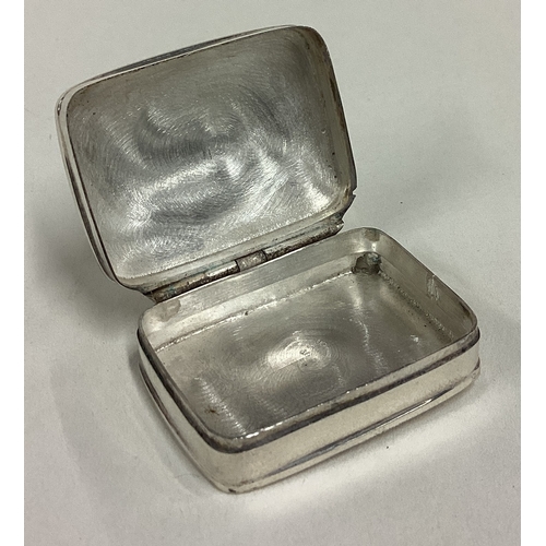 402 - A silver pill box with hinged lid. Marked to interior. Approx. 14 grams. Est. £20 - £30.