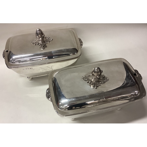 441 - A clean pair of early 19th Century George III silver sauce tureens and covers. Fully marked. London ... 