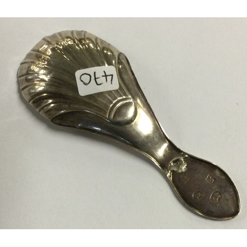 470 - An 18th Century George III silver fluted caddy spoon. Sheffield 1789. Approx. 8 grams. Est. £30 - £4... 