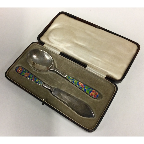 501 - A rare cased silver and enamelled pastry set. By Bernard Instone. Approx. 46 grams. Est. £200 - £300... 