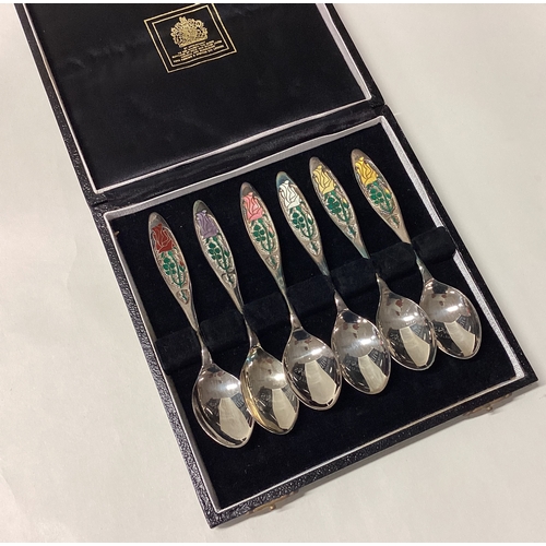 502 - A rare set of six silver and enamelled rose spoons. Birmingham 1978. By Toye Kenning & Spencer. Appr... 