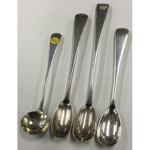 504 - A large silver OE pattern mustard spoon together with three others. Various dates and makers. Approx... 