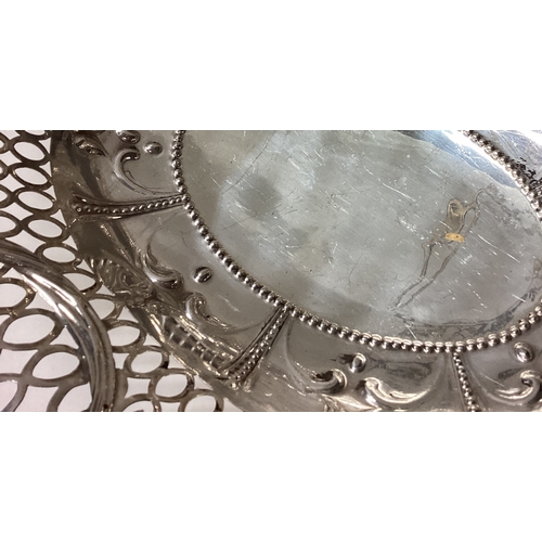 519 - A large 18th Century George III pierced silver basket chased with figural decoration. Fully marked t... 