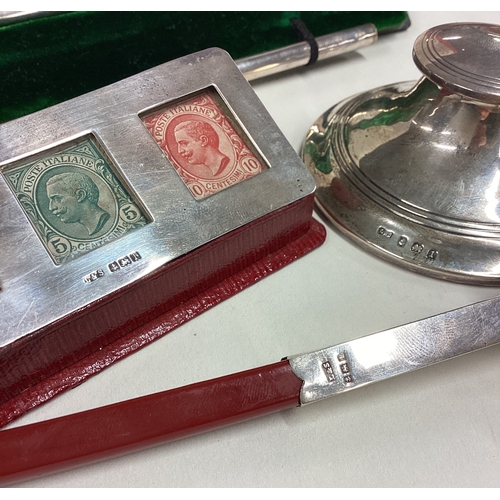 52 - A rare novelty silver desk set comprising of triple stamp case, inkwell and ink pen. Birmingham 1910... 