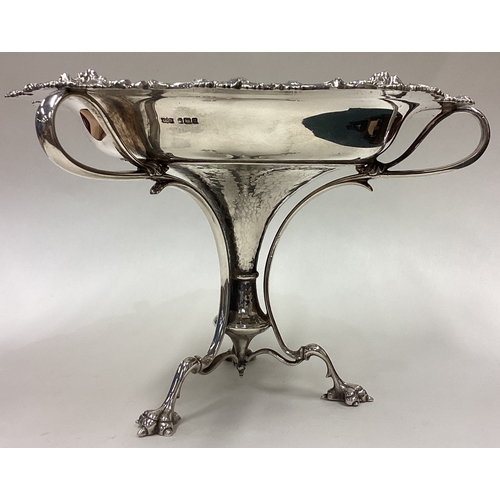 533 - A stylish Arts and Crafts heavy silver bon bon dish with vine decoration. Sheffield. By JD&S. Approx... 