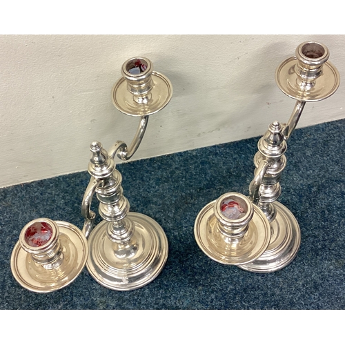 534 - A good pair of silver candelabras in the Georgian style with removable tops. London. By RC. Approx. ... 