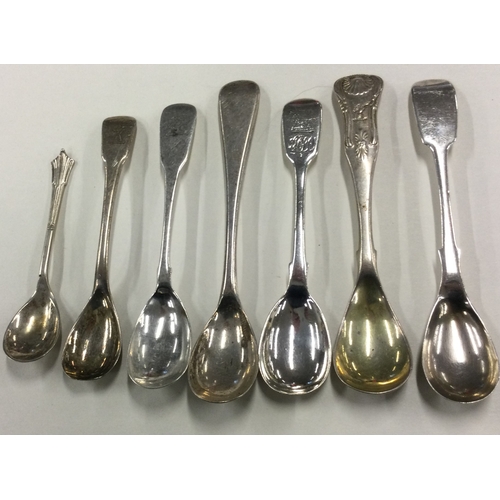 555 - A silver King's pattern mustard spoon together with six others. Various dates and makers. Approx. 76... 