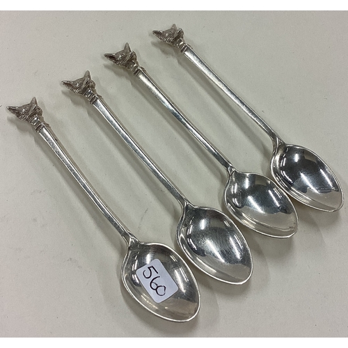 560 - A set of four silver spoons cast with fox head finials. Birmingham 1974. Approx. 50 grams. Est. £50 ... 