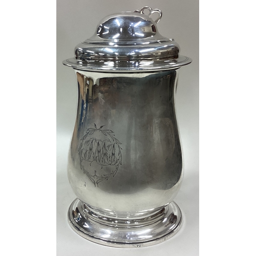 564 - A good quality plain George III silver dome topped tankard with pierced thumb piece to pedestal base... 