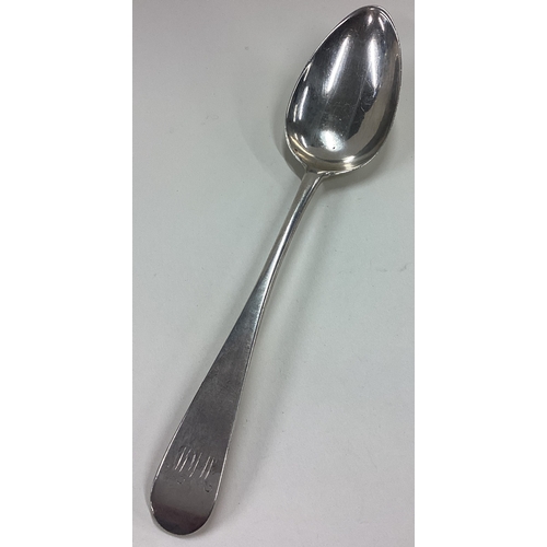 569 - INVERNESS: A Scottish silver serving spoon. Circa 1780. Approx. 59 grams. Est. £60 - £80.