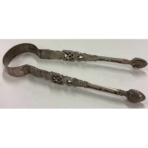 570 - A pair of Victorian silver ice tongs with pierced heart decoration. London 1896. Approx. 46 grams. E... 