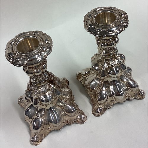 577 - A pair of Continental silver Judaica candlesticks. Circa 1900. Approx. 138 grams. Est. £120 - £150.