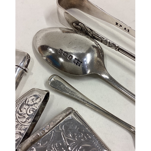 593 - Two good silver vesta cases, tongs etc. Approx. 80 grams. Est. £30 - £50.