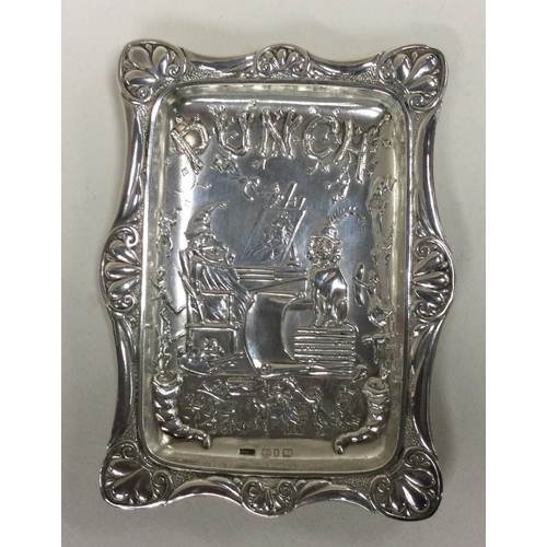 601 - A Victorian silver dish with chased Punch & Judy decoration. Birmingham 1893. Approx. 34 grams. Est.... 