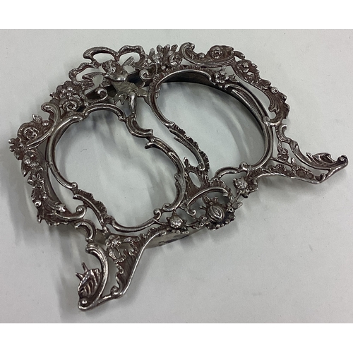 610 - A good pierced silver double picture frame cast with birds. London. By WC. Approx. 62 grams. Est. £8... 