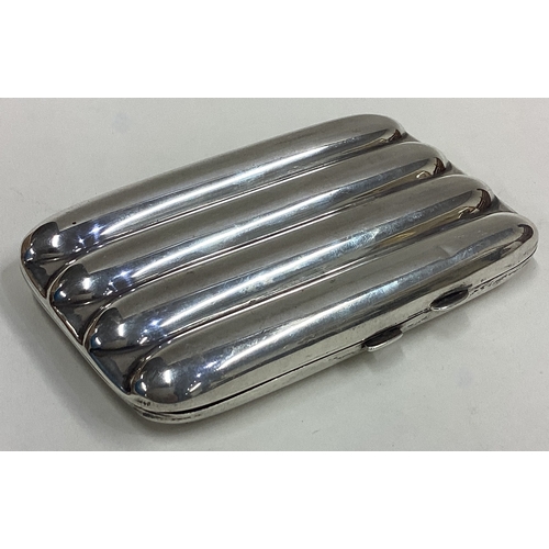 613 - A plain silver four-finger cigar case. Birmingham. Approx. 140 grams. Est. £70 - £80.