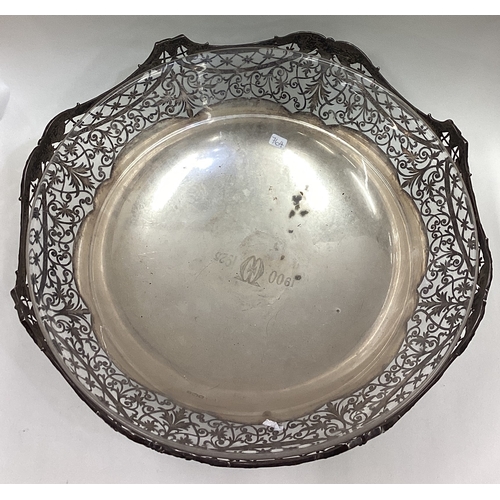 616 - A large attractive pierced silver bowl on spreading foot with vine decoration. Sheffield. By Mappin ... 