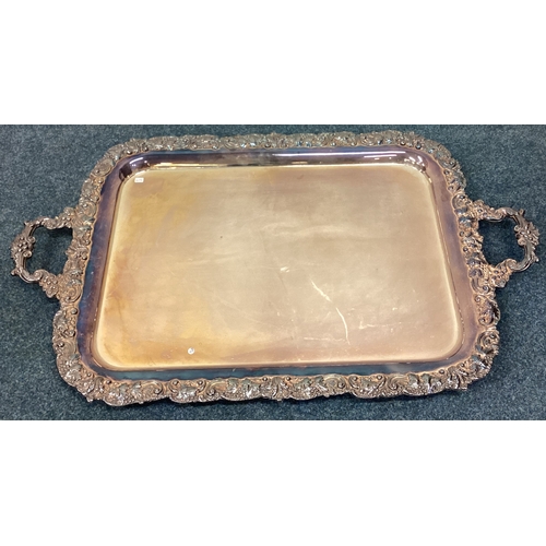 619 - A large heavy silver plated gallery tray with chased border. Est. £20 - £30.