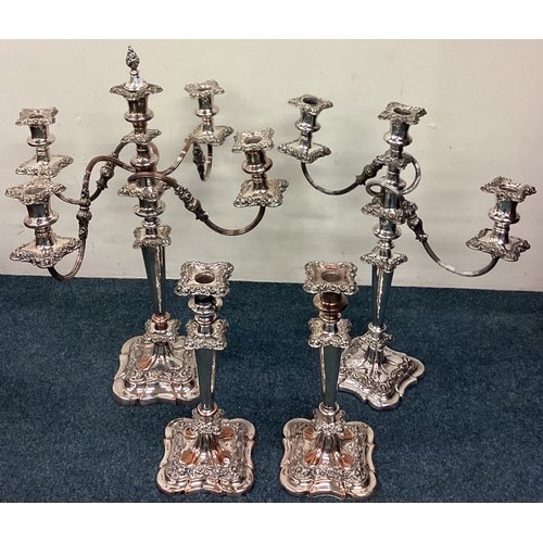 620 - A suite of Old Sheffield Plate candlesticks, centerpiece etc. Est. £60 - £80.