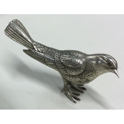 623 - A finely cast silver figure of a bird. London 2017. Approx. 308 grams. Est. £300 - £400.