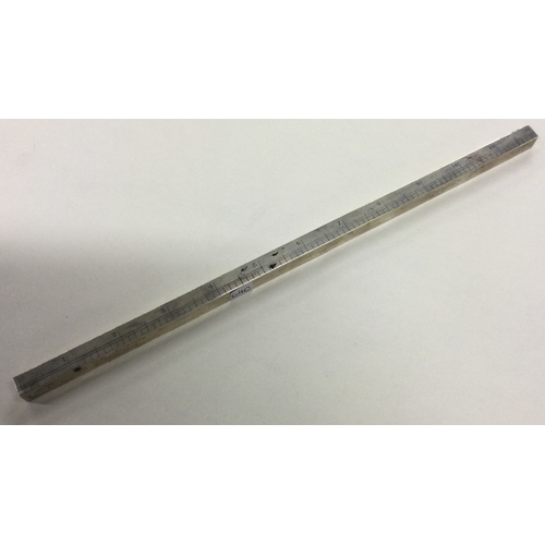 640 - A large novelty Edwardian silver measuring ruler. London 1902. By William Hornby. Approx. 53 grams. ... 