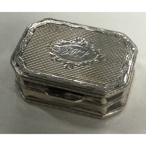 646 - An engine turned silver snuff box with hinged lid bearing import marks. Approx. 22 grams. Est. £20 -... 